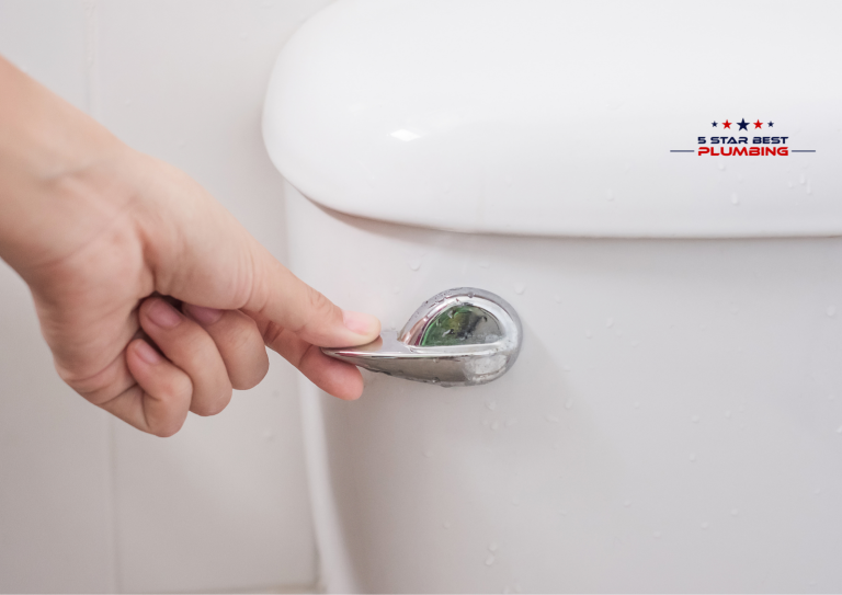 Gemini said Here is the alt text for your blog image, designed to be both descriptive for accessibility and optimized for SEO. Alt Text A close-up shot of a hand pressing down on a chrome toilet flush lever on a white ceramic tank. Water droplets are visible on the tank surface.